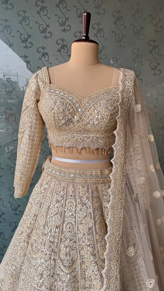 Champagne Gold Heavy Embroidered Lehenga Choli with Mirror and Zari Work