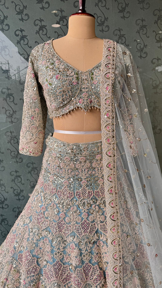 Ethereal Powder Blue Lehenga with Blush Tones and Crystal Accents