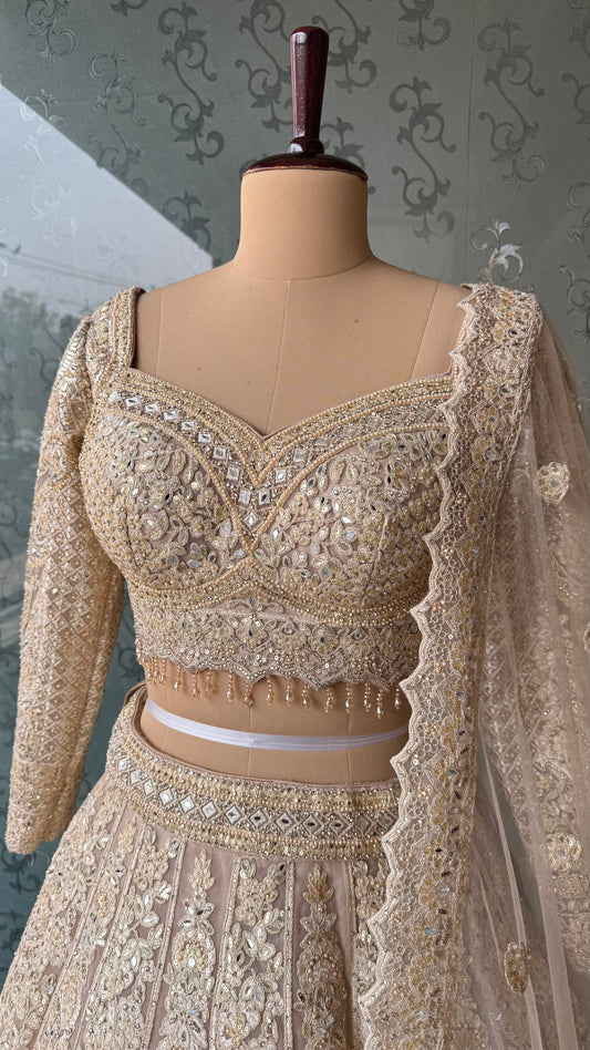 Champagne Gold Heavy Embroidered Lehenga Choli with Mirror and Zari Work