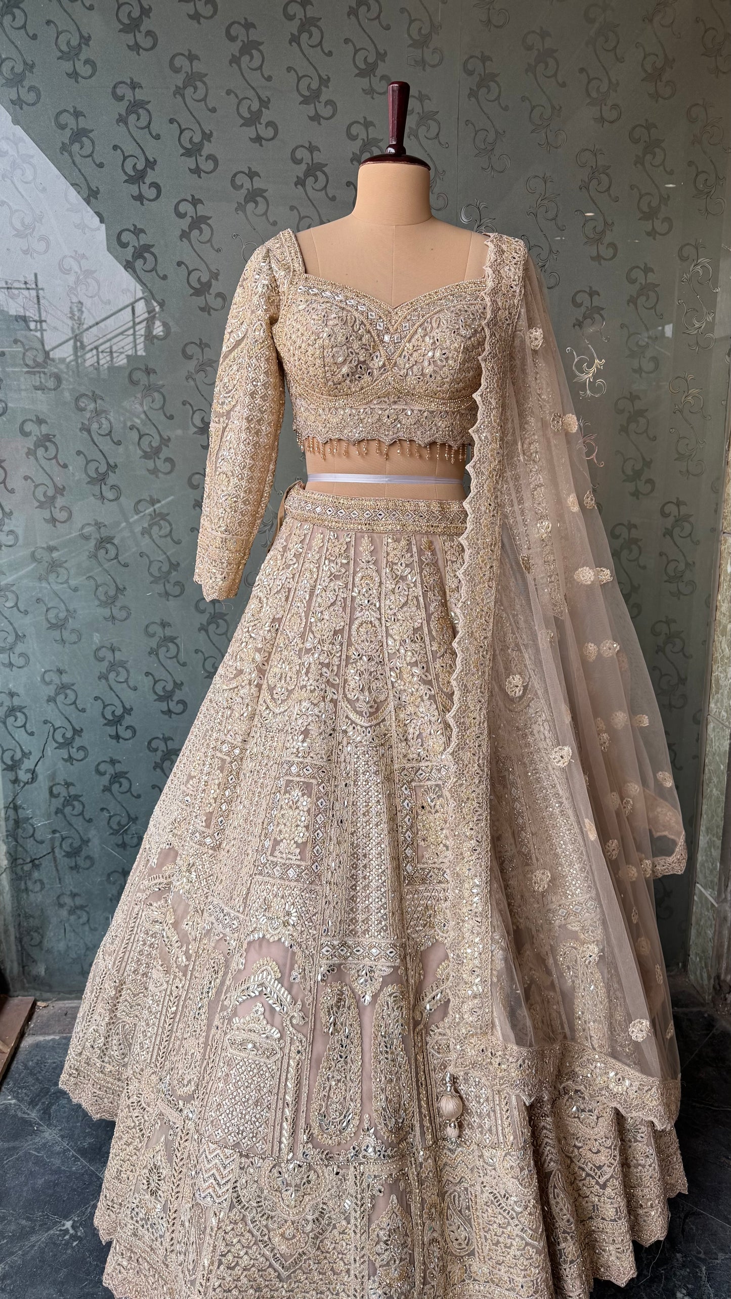 Champagne Gold Heavy Embroidered Lehenga Choli with Mirror and Zari Work