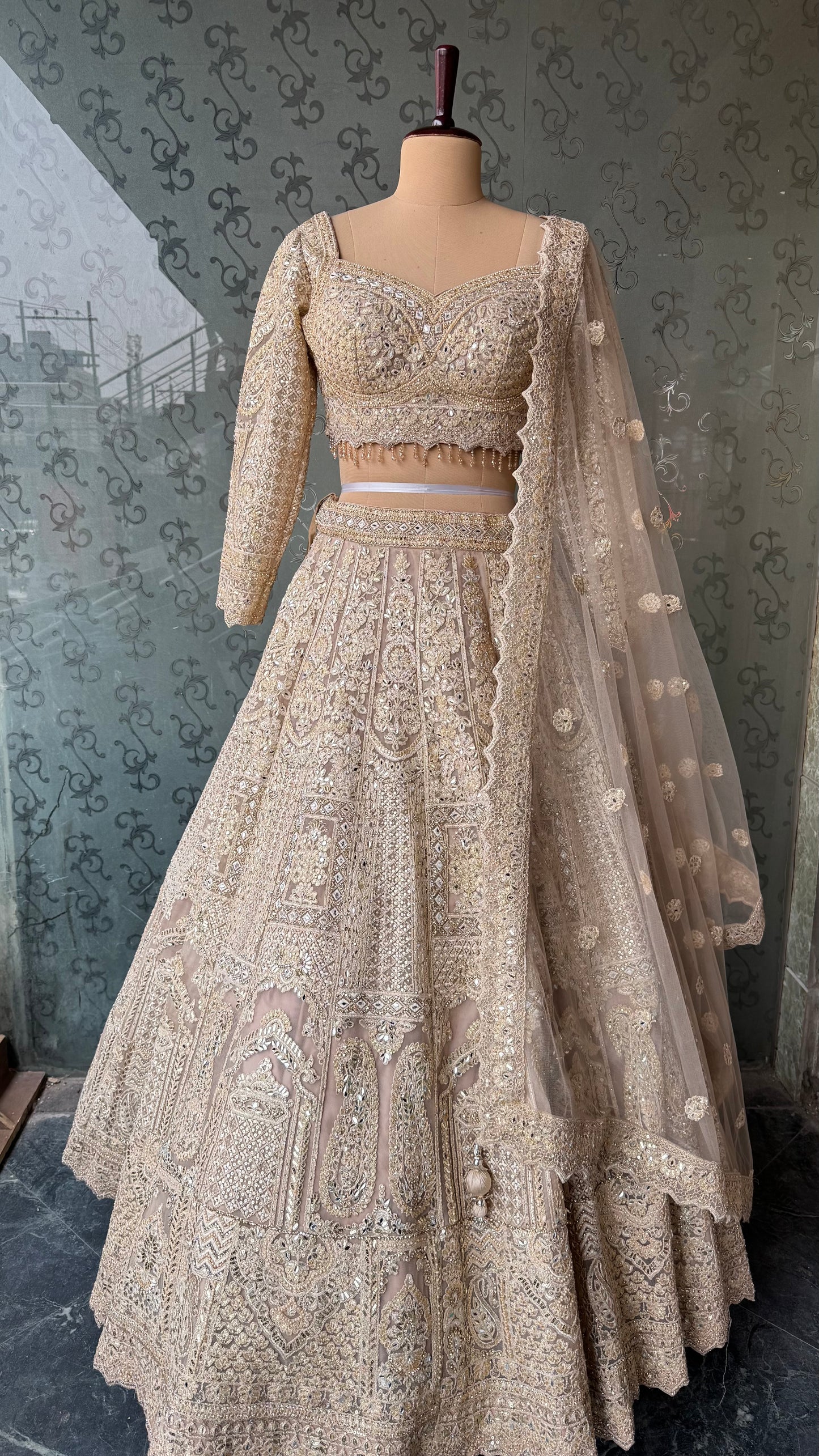 Champagne Gold Heavy Embroidered Lehenga Choli with Mirror and Zari Work
