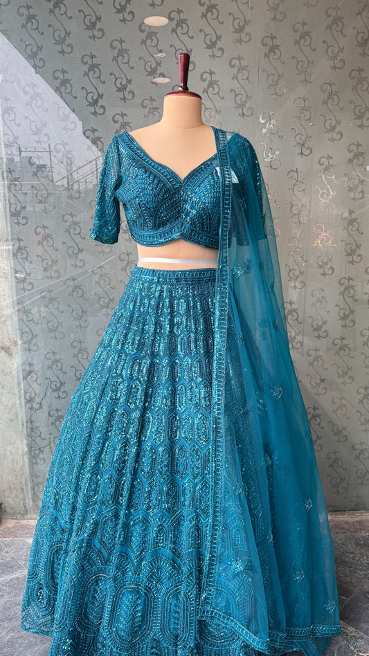 Teal Blue Sequined Embroidered Lehenga Choli with Net Dupatta