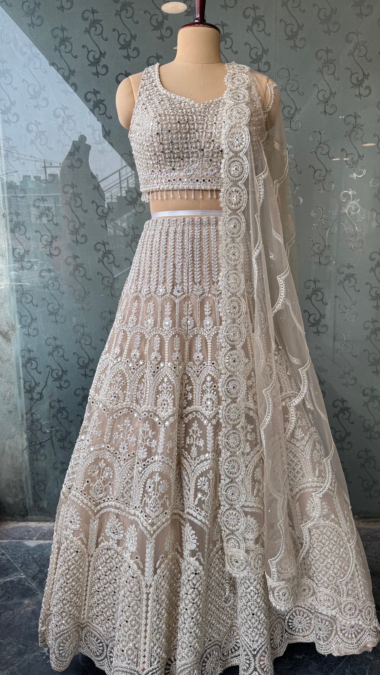 Luxury ivory Heavy Embroidered Net Lehenga Choli with Mirror & Thread Work