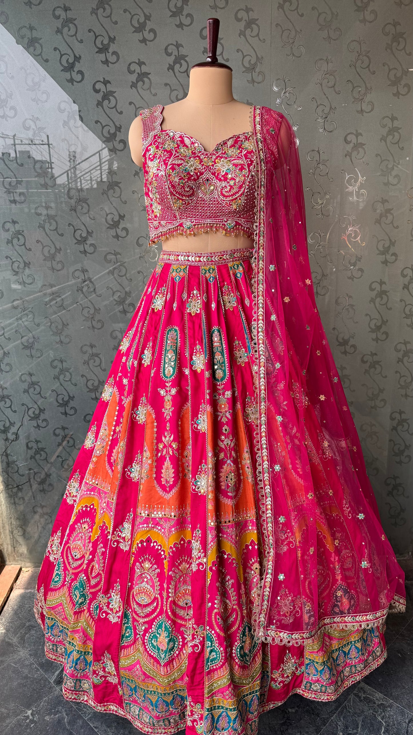 Vibrant Rani Pink Multicolor Embroidered Lehenga Choli with Mirror and Thread Work