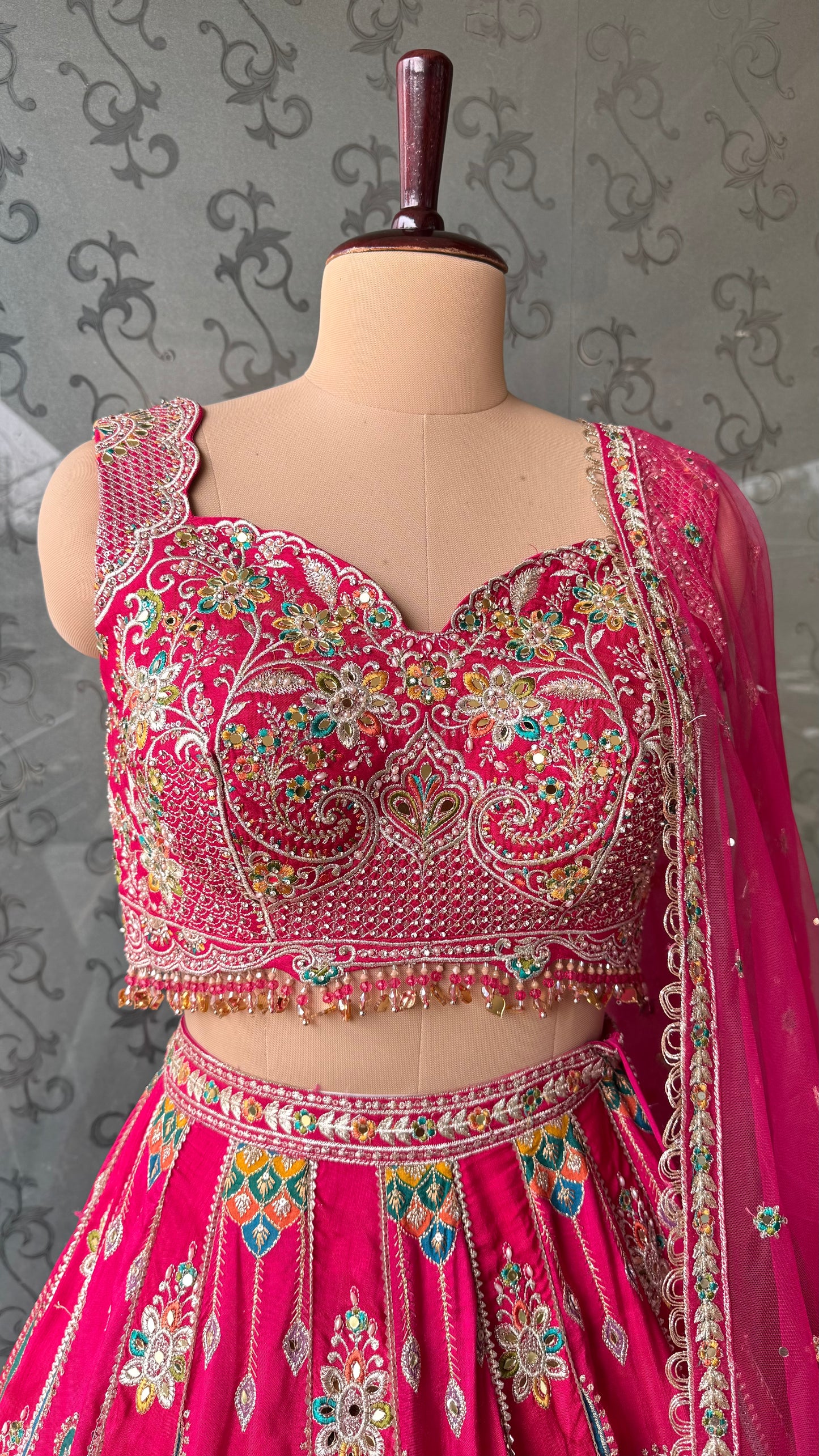 Vibrant Rani Pink Multicolor Embroidered Lehenga Choli with Mirror and Thread Work