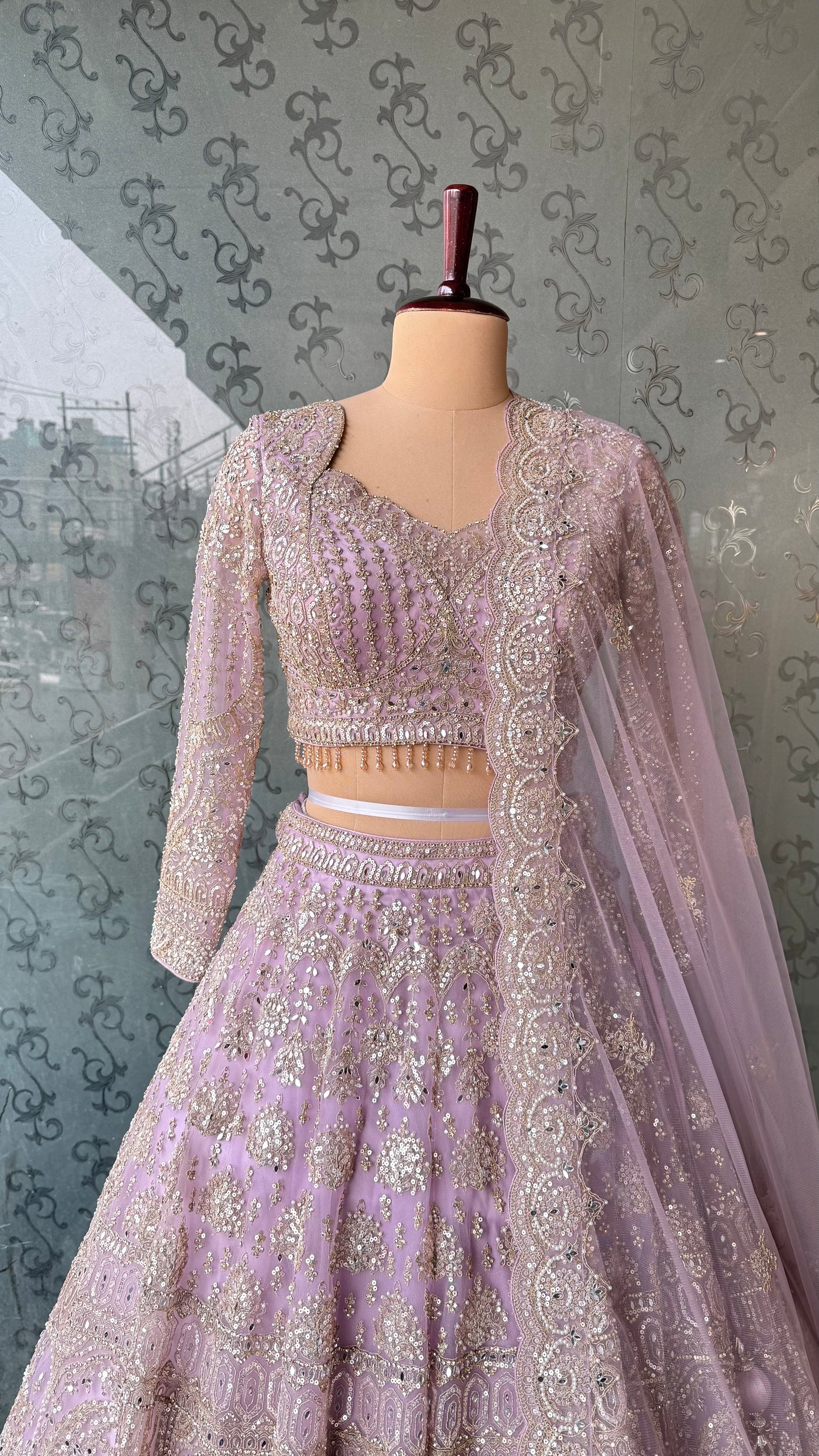 Lavender Embellished Net Lehenga Choli with Intricate Sequin and Zari Work