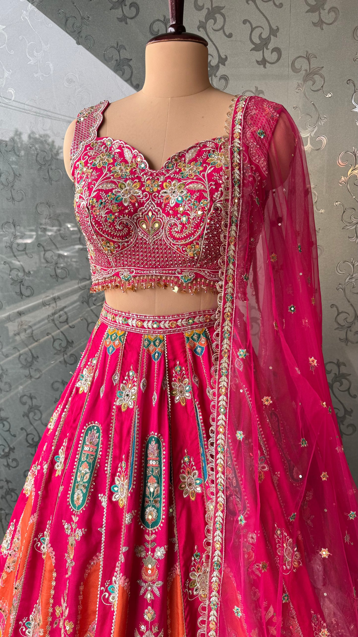 Vibrant Rani Pink Multicolor Embroidered Lehenga Choli with Mirror and Thread Work