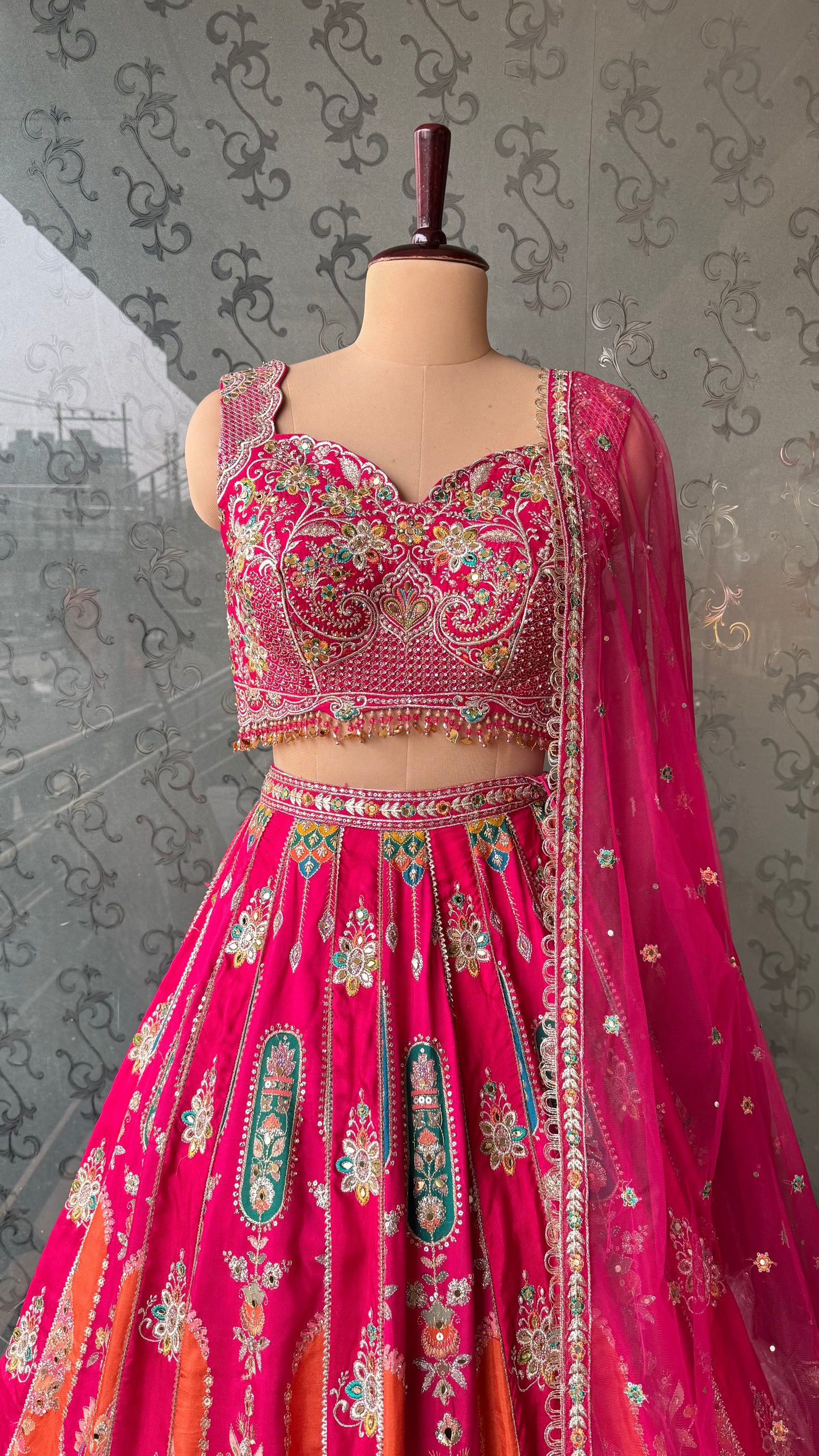Vibrant Rani Pink Multicolor Embroidered Lehenga Choli with Mirror and Thread Work