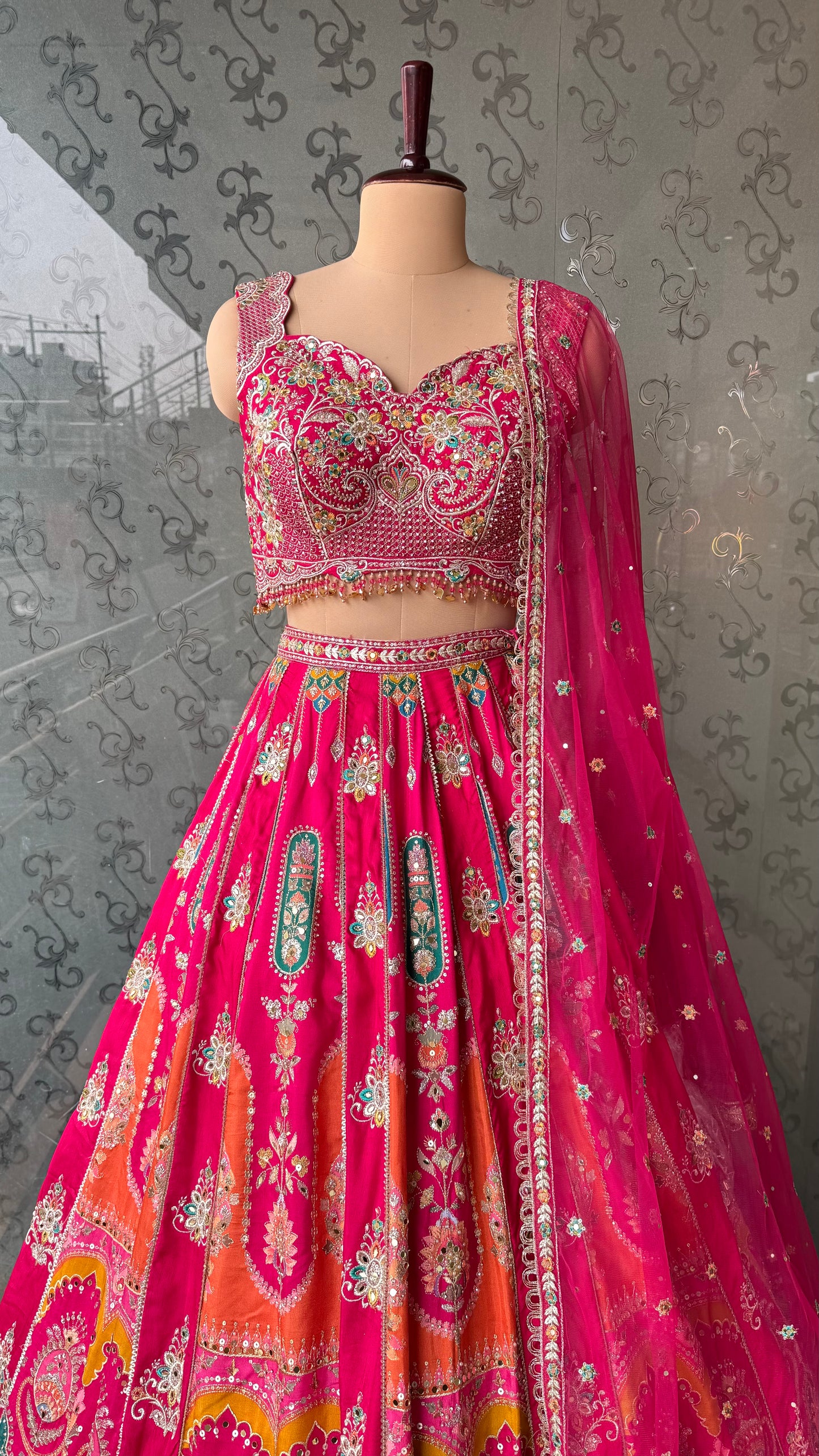 Vibrant Rani Pink Multicolor Embroidered Lehenga Choli with Mirror and Thread Work